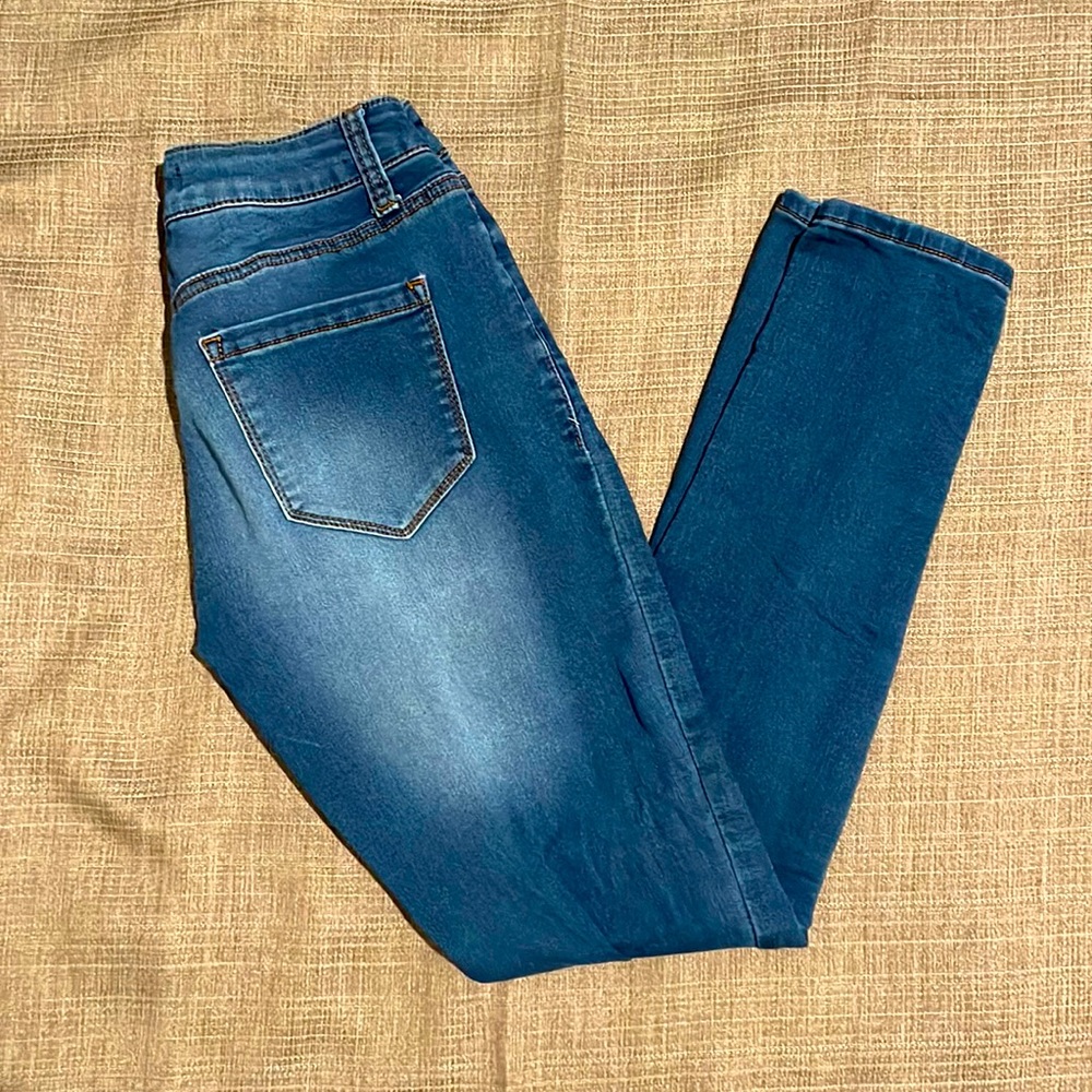 Angel Kiss size 5 blue skinny jeans. Worn only a handful of times. Good stretch